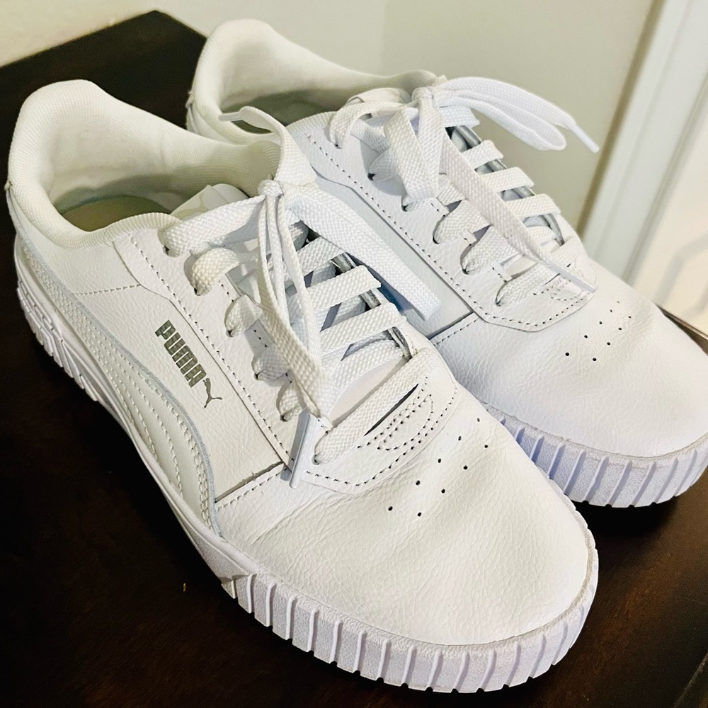 White Pumas in excellent condition. Only worn a few times.
